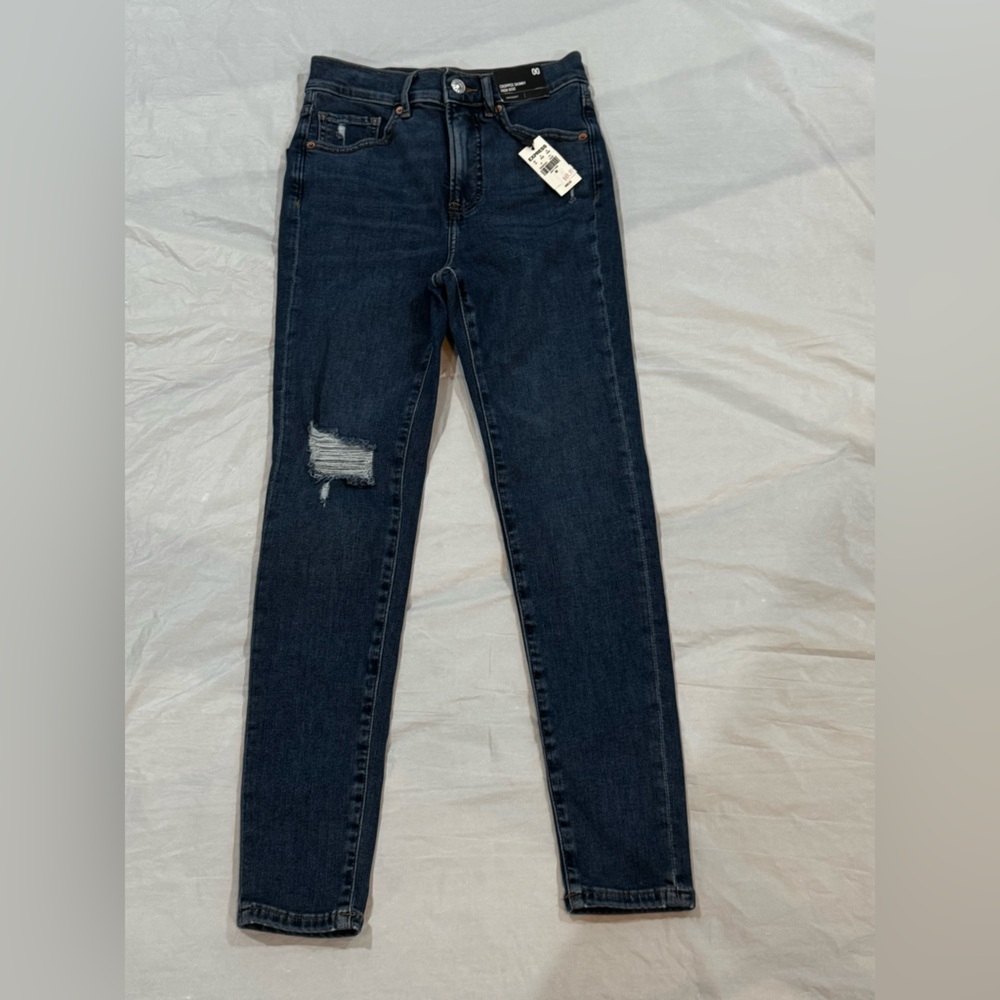 Express Skinny Blue Jeans with Distressed Design